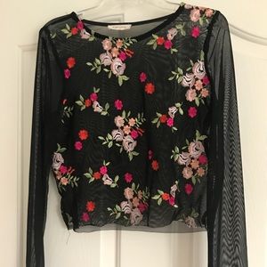 Embroidered long sleeve.